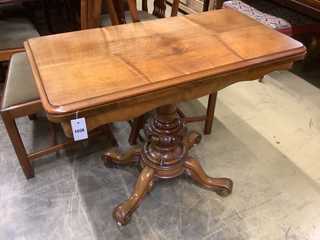 A Victorian walnut folding top tea table, width 92cm